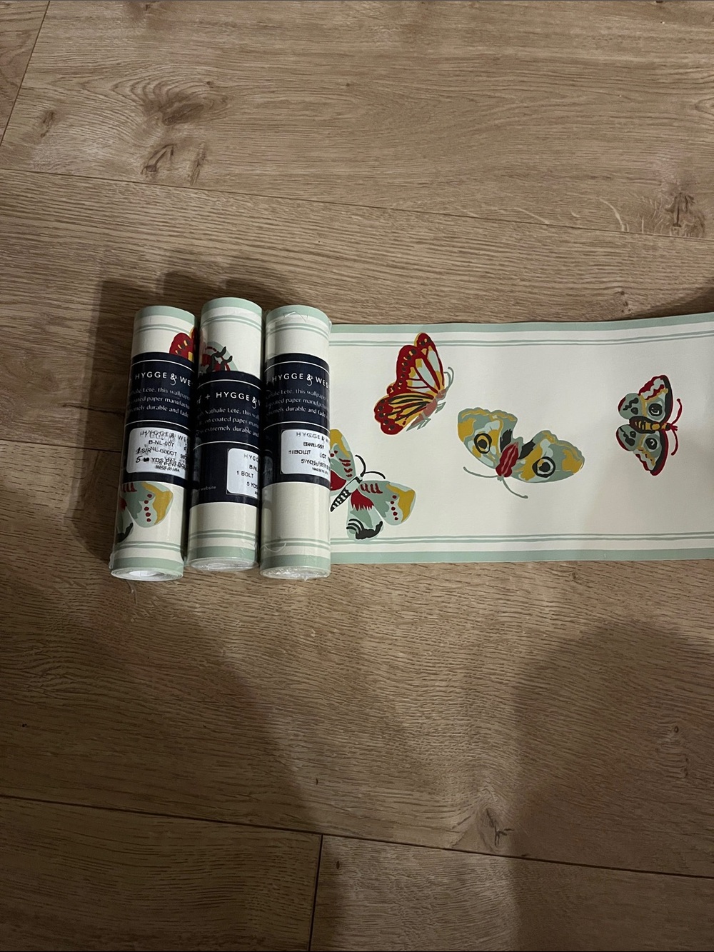 Hygge & West butterfly border wallpaper